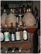 bottles in an old cantina in barga vecchia