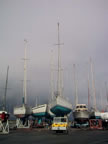 boats with storm coming in from the mountains