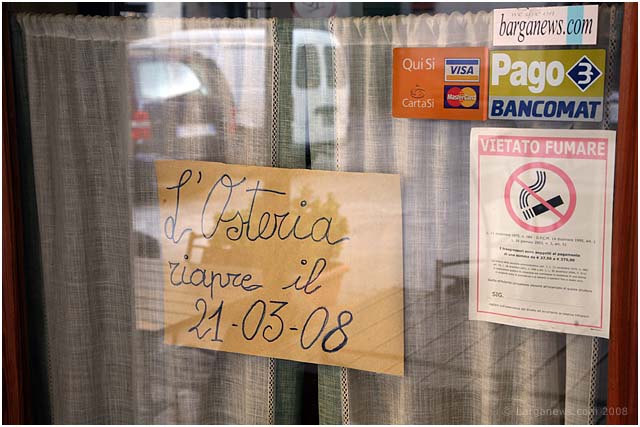 Closed and open doors in Barga