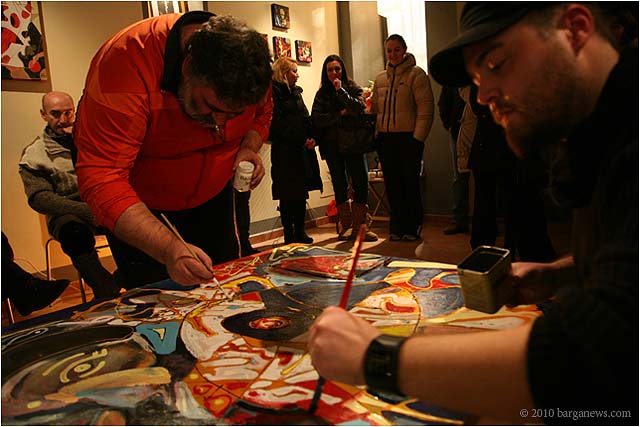 One painting, 3 pairs of hands