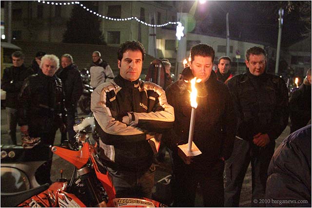 Vespa and motorbike torchlight procession