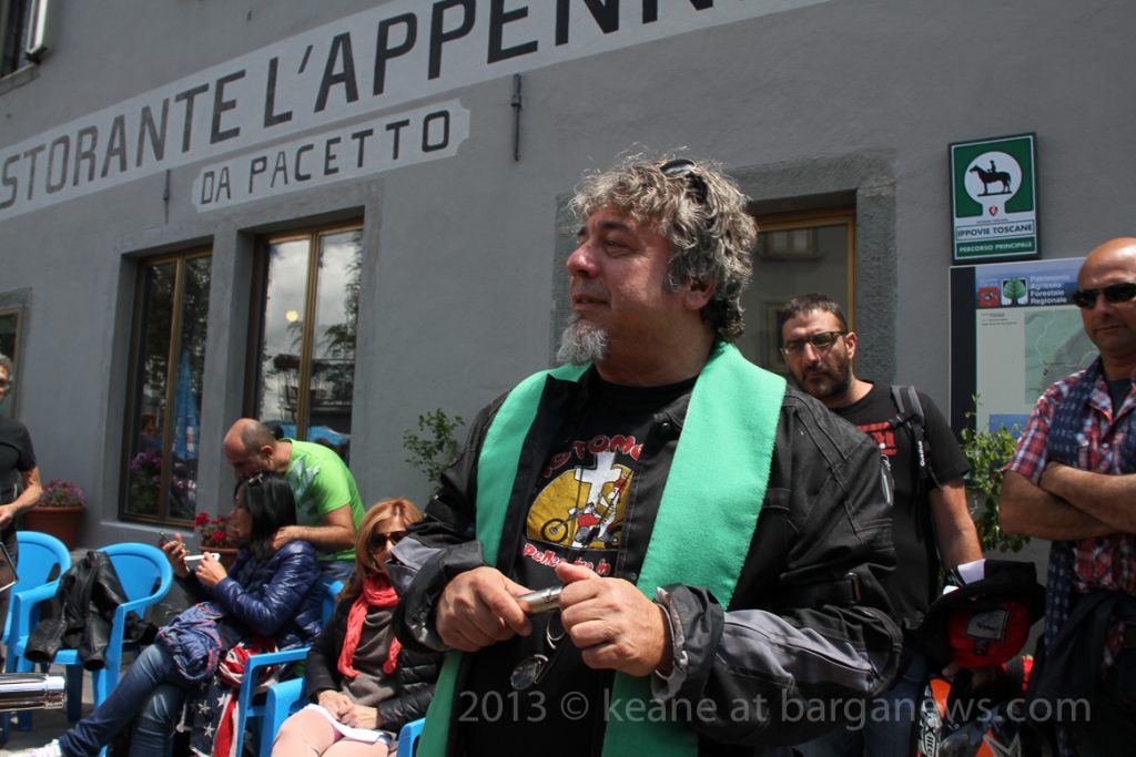 Motomessa – Priest on a Vespa blesses the crowd