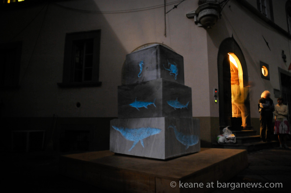 Marble, full moon, mist and a darkened city