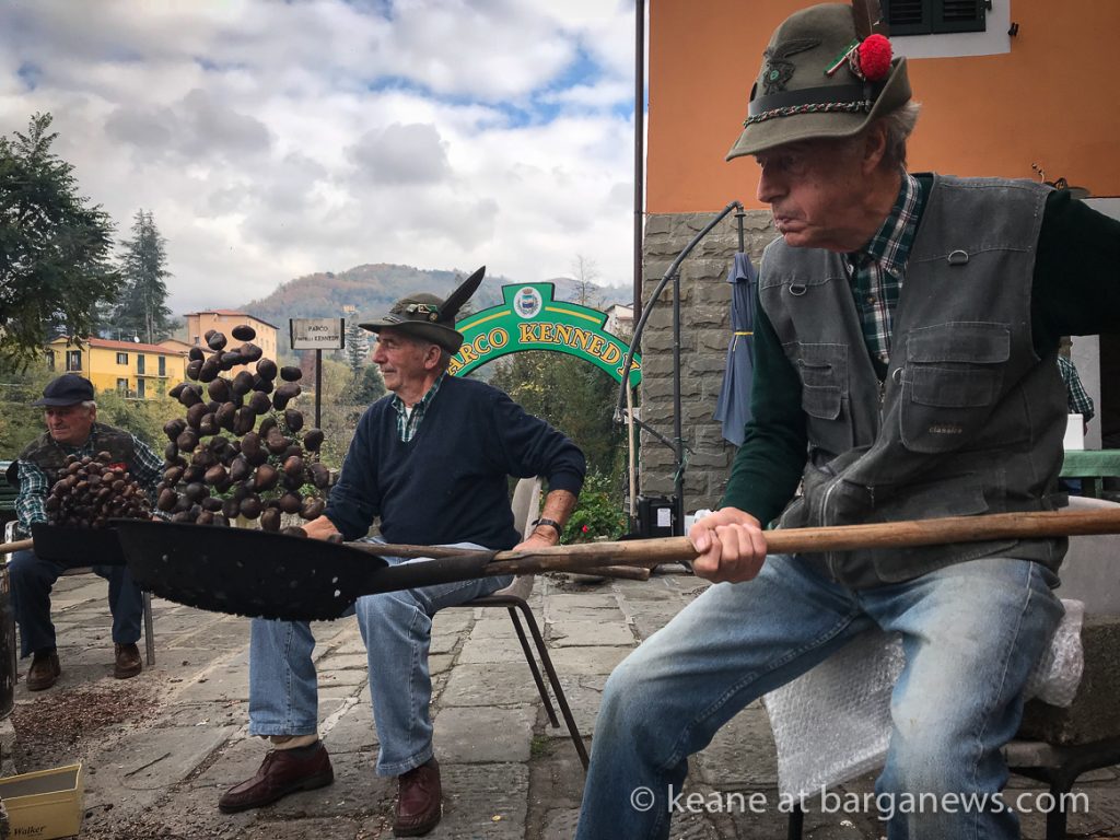 Alpini roasting chestnuts in Barga