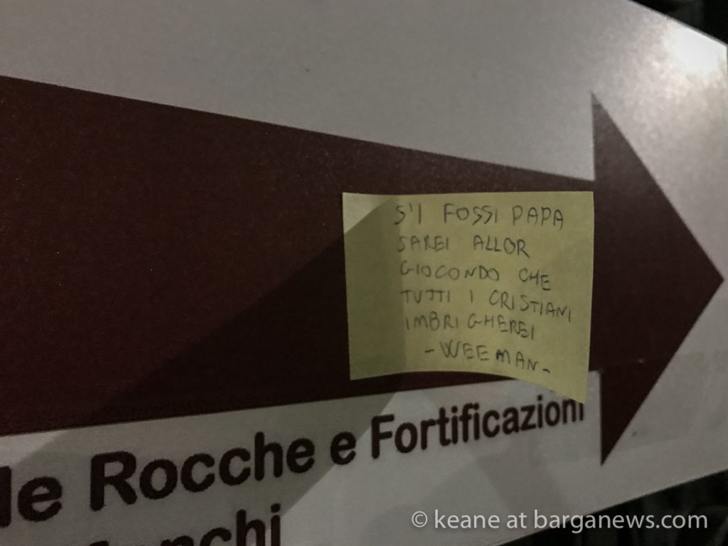 Sticky label graffiti containing late 13th century poetry