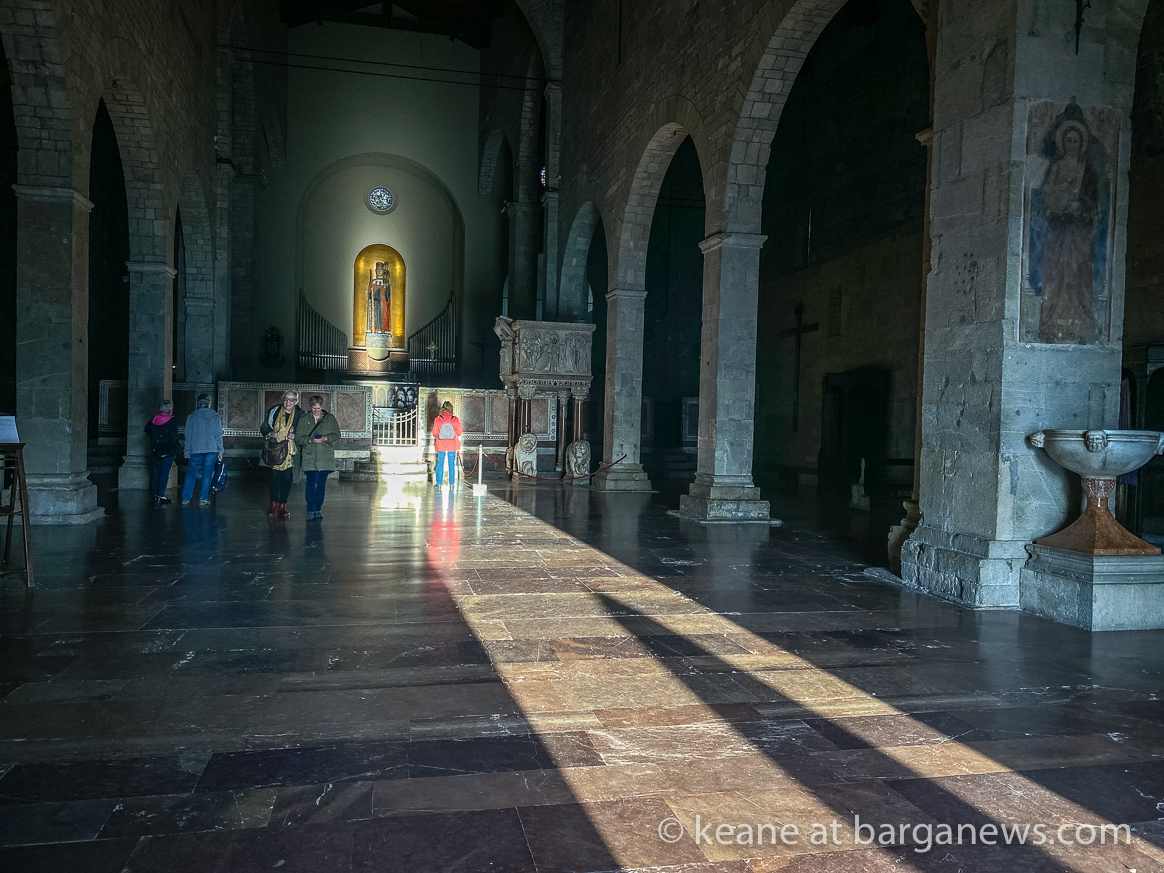 Winter sunlight on the huge wooden statue of St. Christopher