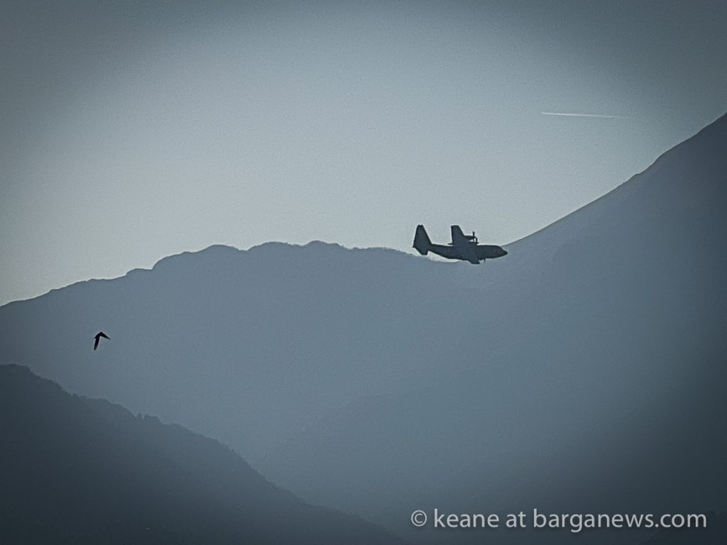 Military aircraft flying low in the area