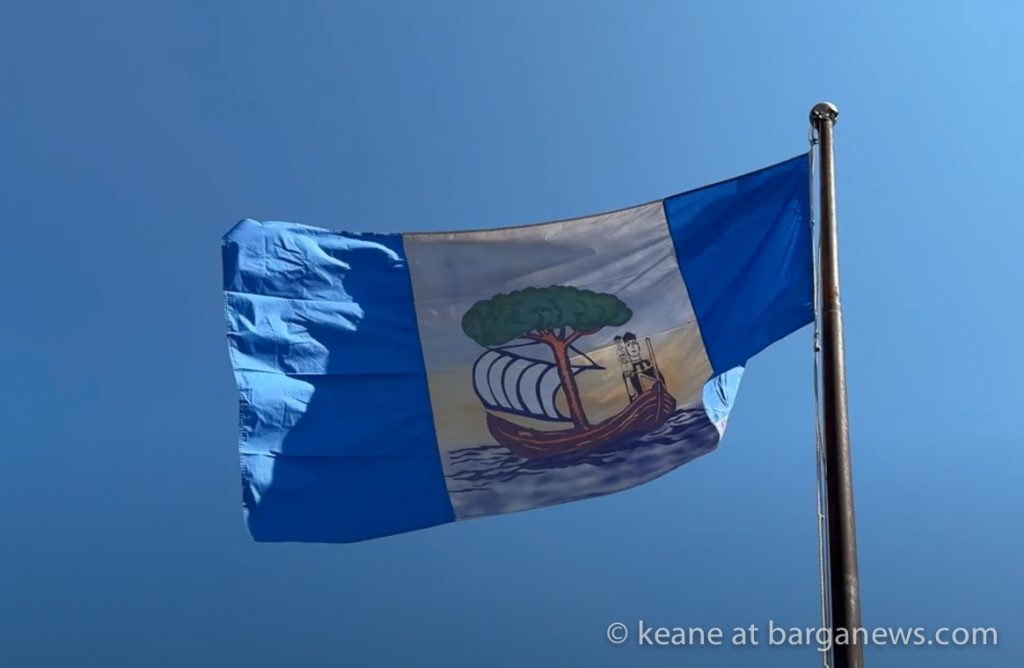 Raising the flag over Barga