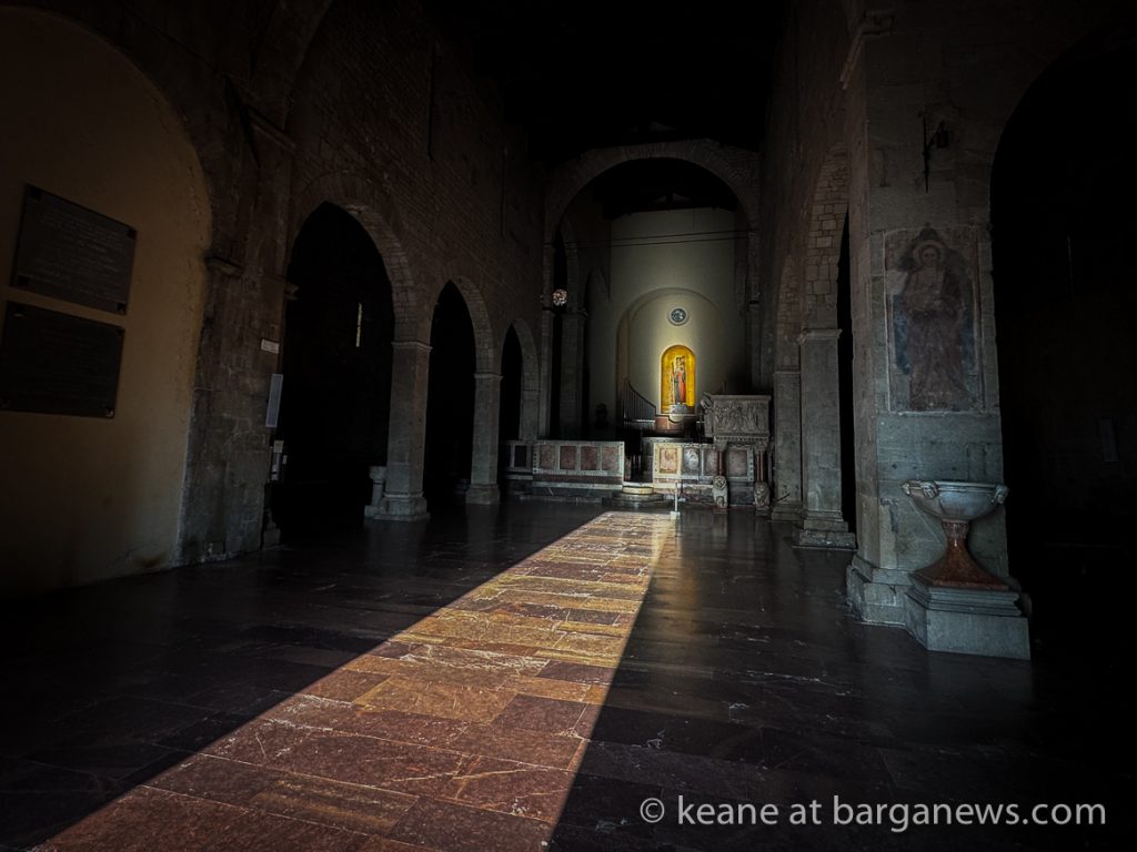 Sunlight illuminates the statue of St. Christopher